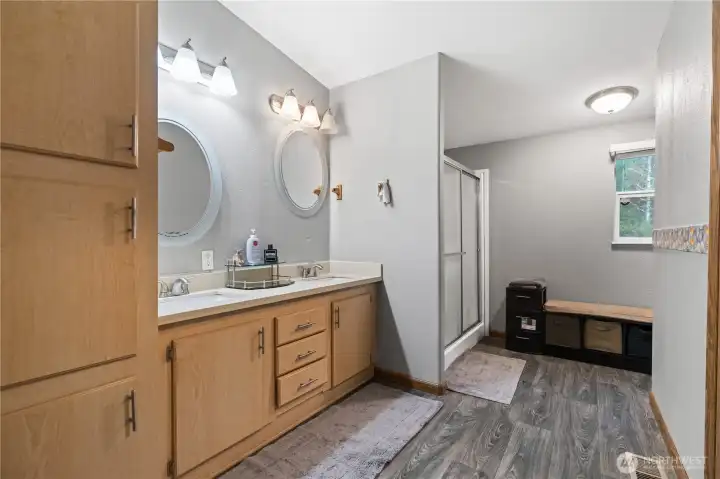 The primary bathroom with dual vanity.