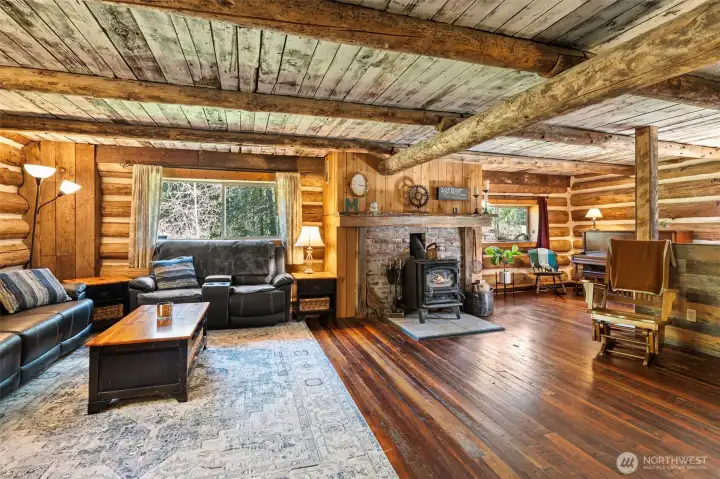 Living room with office fireplace and extra office space