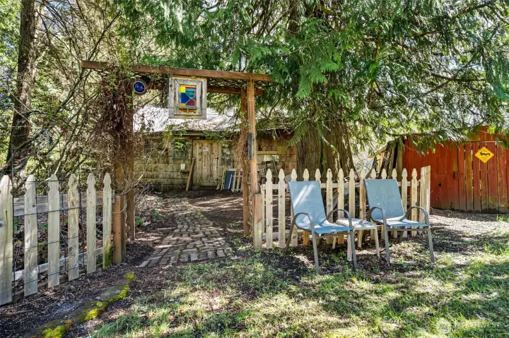 Cutest pathway to the shop and carport