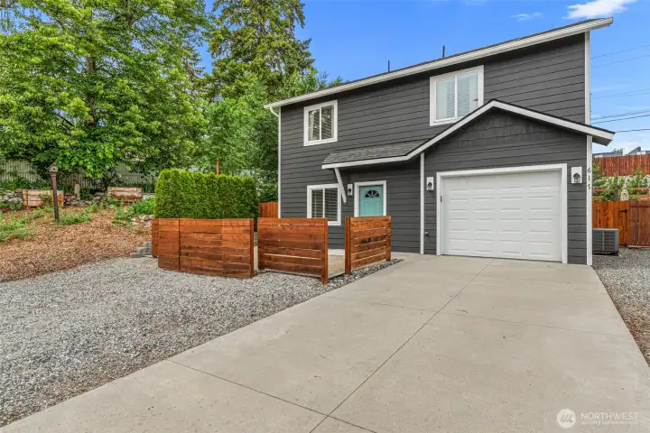 Modern design, private entry courtyard, and attached garage welcome you home.