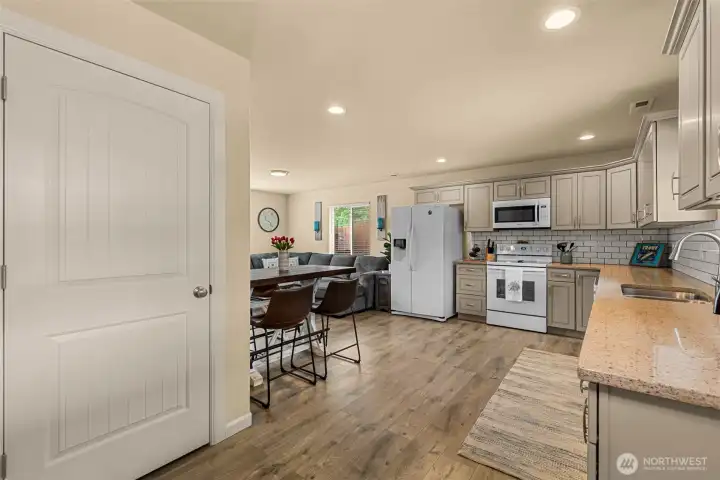 Inviting open layout connects the kitchen, dining, and living areas for comfortable entertaining.