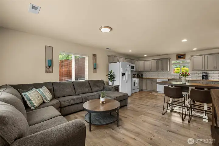 Warm and welcoming great room designed for everyday living and relaxation.