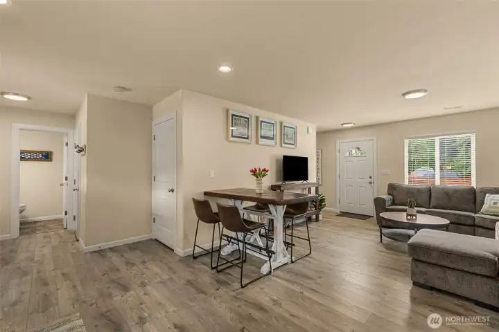 Comfortable gathering space featuring durable flooring and abundant natural light.