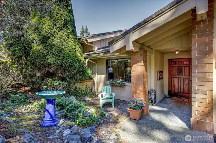Lovely entry with a sweet garden space