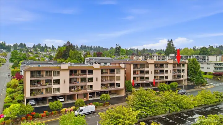 Welcome to The Executive ! Top Floor Condo!  Small arrows indicate 2 parking spaces that are not tandem!