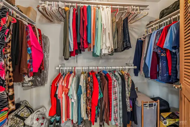 Primary bedroom walk-in closet
