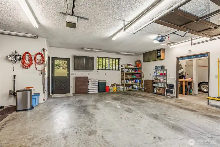 Oversized 2 car garage with half bath