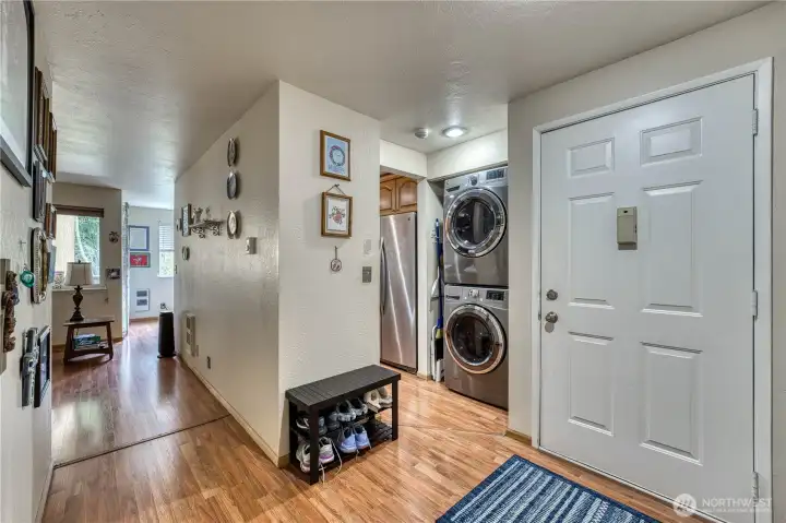 Entrance to galley kitchen to right, hallway to Living Room to the left...