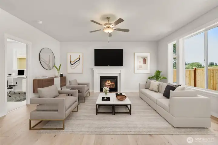 Living room anchored by your elegant gas fireplace