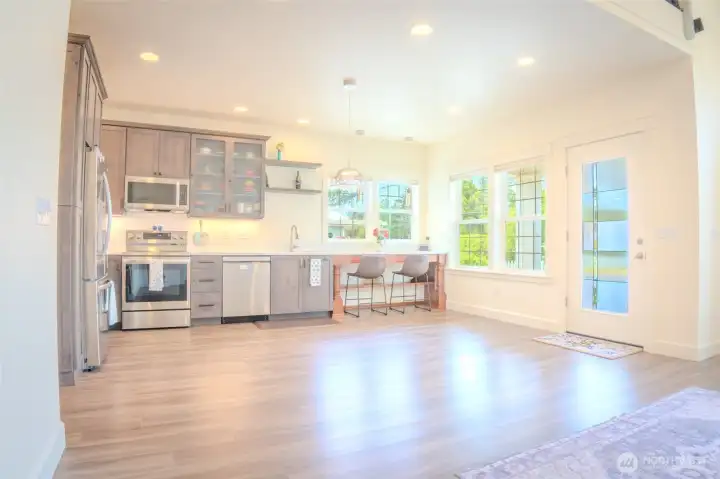 Open concept kitchen with high end appliances