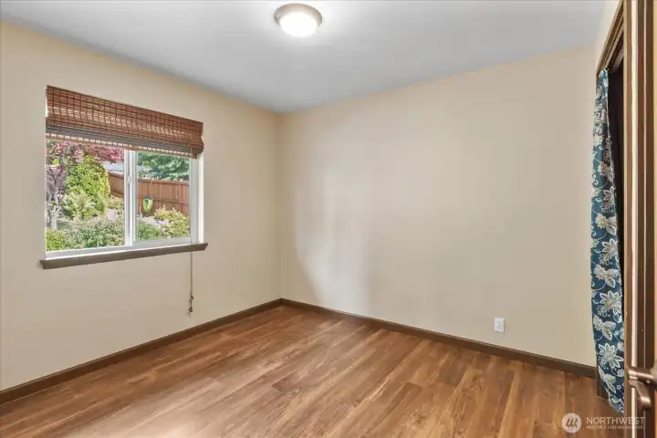 Second bedroom with a view of the backyard oasis. Second bedroom with a view of the backyard oasis.