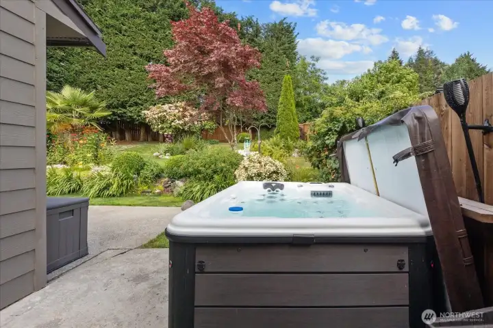 Enjoy a peaceful garden view from the comfort of the hot tub. Enjoy a peaceful garden view from the comfort of the hot tub.