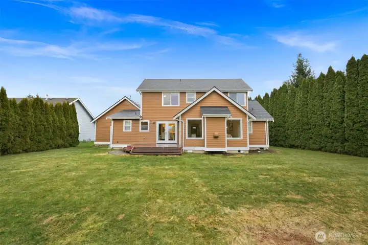 Your private oasis ???—enjoy this spacious backyard surrounded by lush arborvitae trees for ultimate privacy.