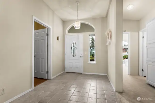 Open foyer with tiled floors