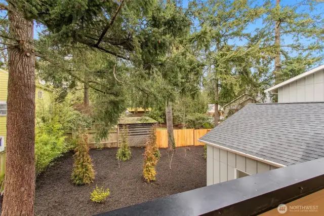 Level 2, Primary Bedroom deck view of backyard.