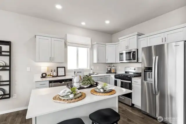 All appliances included! Pictures are representative of Burnham floorplan. Colors and options will vary. Photos from Model Home on 31. Homesite 33 is a mirror image.