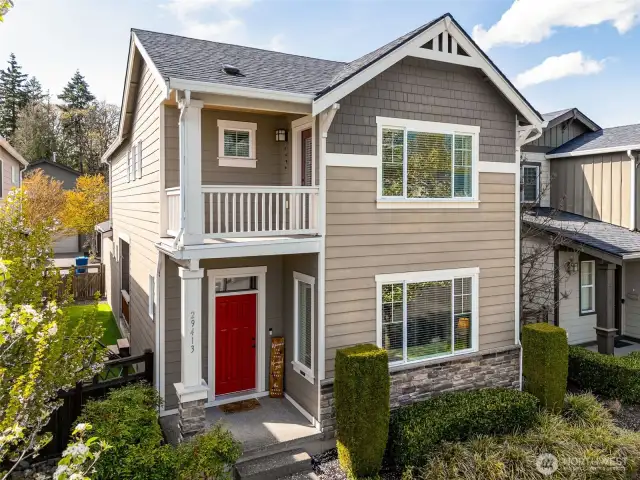 All these homes are located on a "main street" in the community, with front-facing porches, and the garage is accessed via the alley in back.