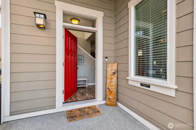 Warm & welcoming covered front porch!