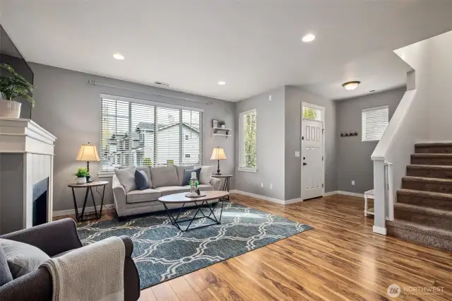 So beautiful, you will love this space! Large windows let the natural light in plus can lights keep the bright, cheery feeling going throughout the home.
