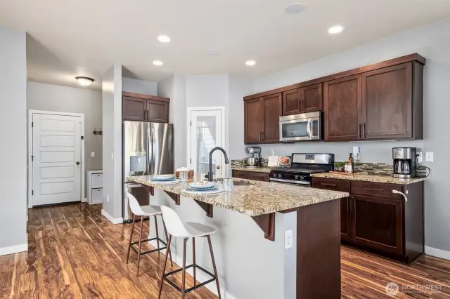 Breakfast bar in the center island works great for breakfast or quick snacks!