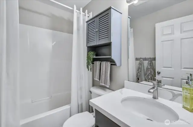 The hall bath has a nice deep tub.