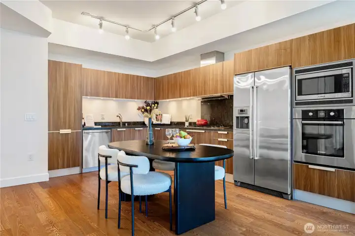 Sleek, modern kitchen with premium finishes, seamlessly integrated into the open layout.