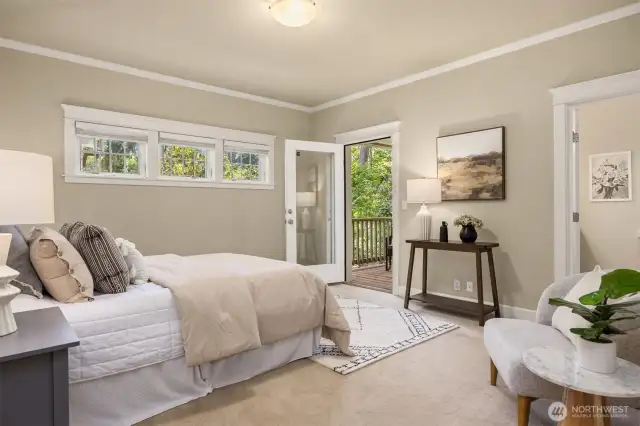 The spacious main floor primary suite provides comfort and ease.