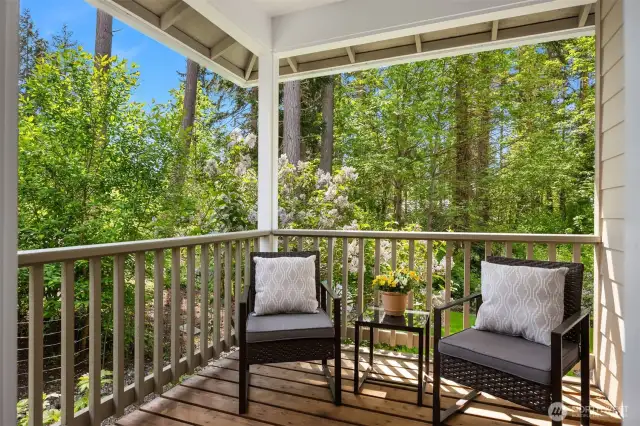 Just off the main floor primary is a private deck, perfect for enjoying your morning coffee.