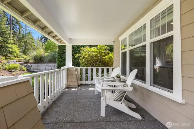 This large covered porch provides a welcoming stop off for friends.