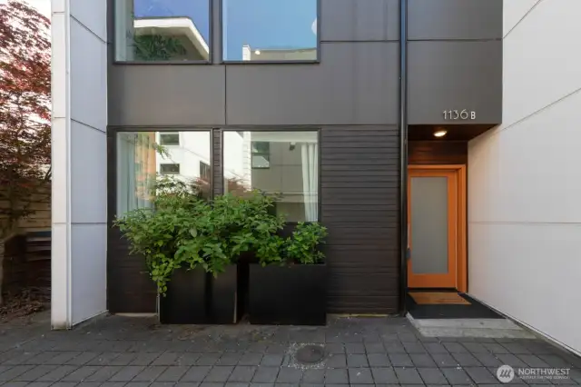 Welcome home to 1136B, your own private entrance tucked at the back of the community.