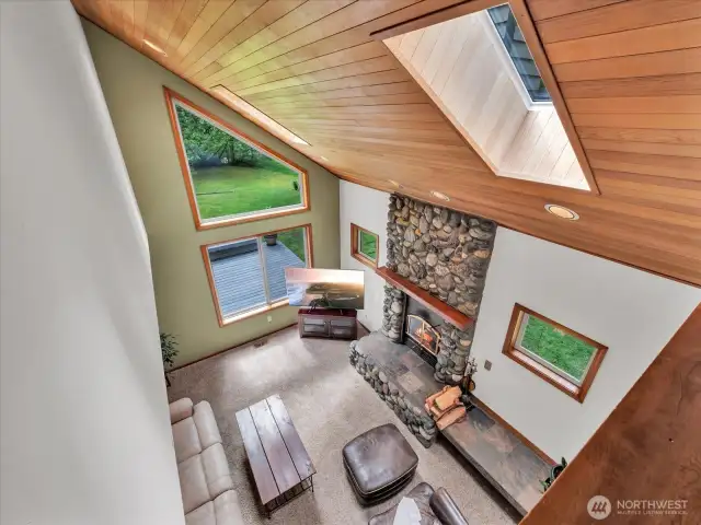 View from upstairs hallway. The large windows add so much daylight and allow you to enjoy the views from every part of the house.