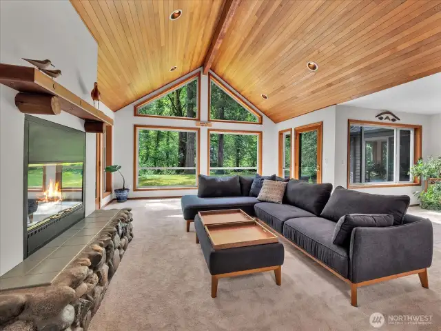 The views are captivating as you enter the home. The beautiful ceilings match the gorgeous views.