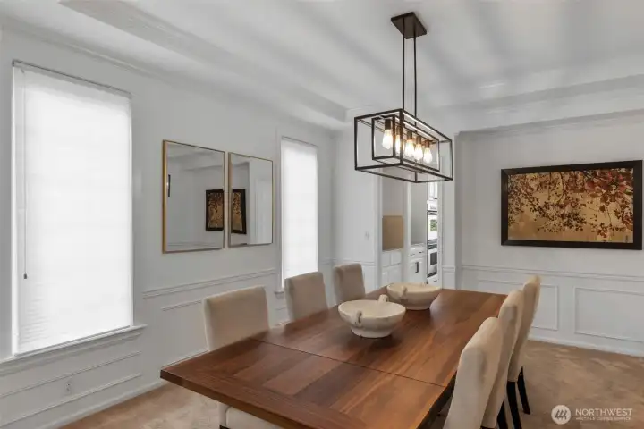 Formal dining room with adjacent coffee/wine bar for convenient entertaining.