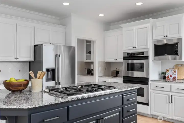 Professionally painted cabinetry, new designer hardware.