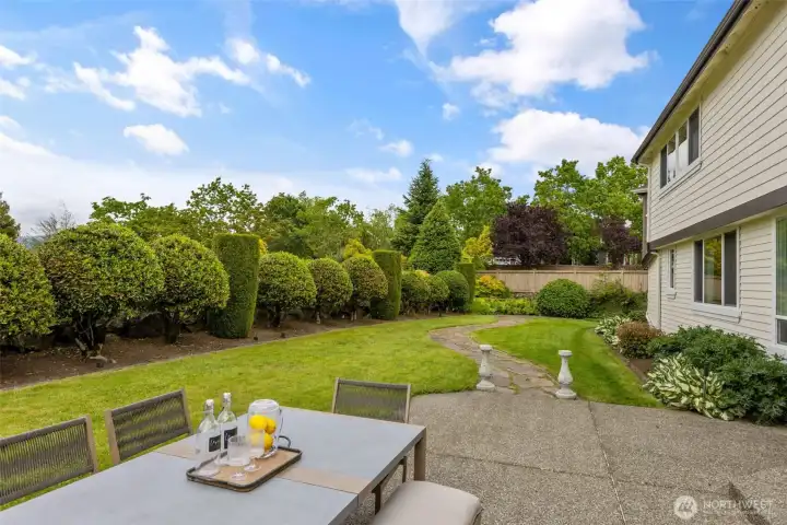 Large, flat yard & entertaining patio.