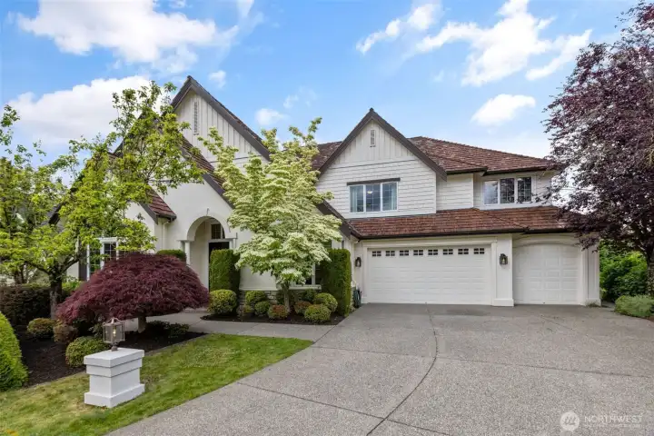 Beautiful curb appeal, 3 car garage, ample parking.
