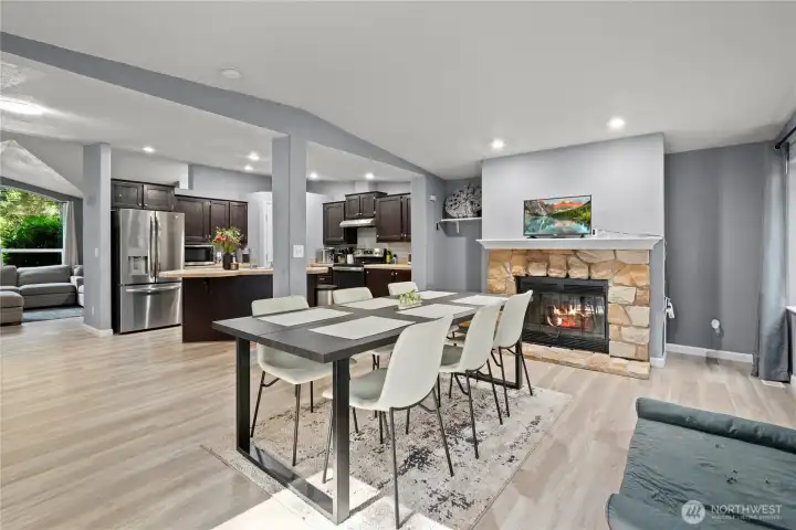 Family Room and view of kitchen area and frieplace