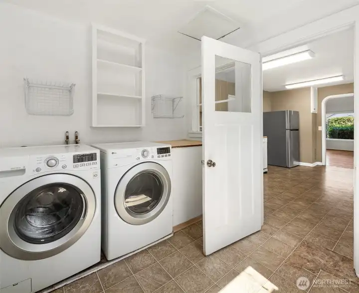 Laundry room with built in storage.