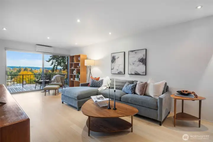 Off the living room is the expansive main deck with panoramic views.