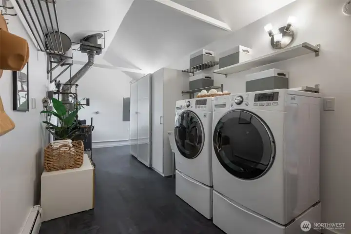 Laundry area with shelving for your organization needs.