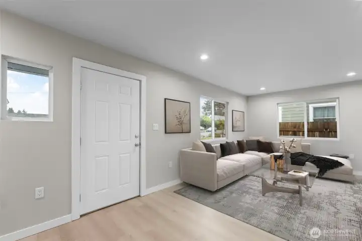 Virtually staged photo of living room.