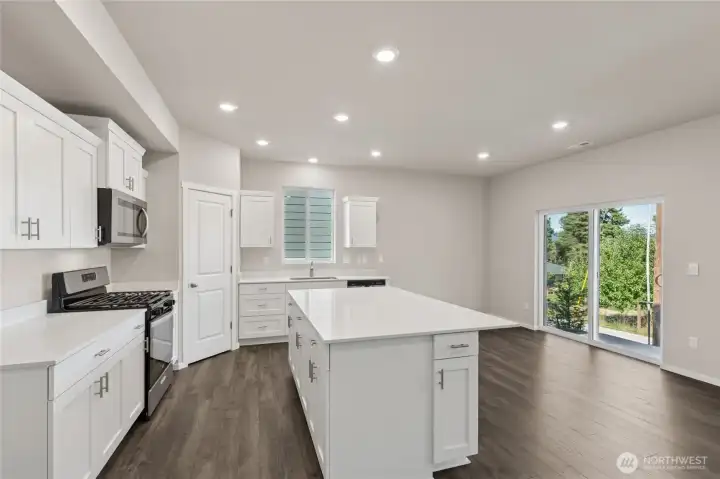 Kitchen and Dining Room. Photos are for representational purposes only, colors, elevation and features may vary.