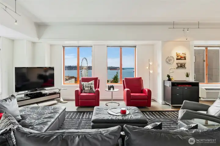 Comfortable seating areas create the perfect space to relax and enjoy the ever-changing waterfront scenery.