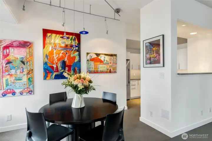 Dining area with great art wall!