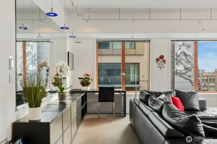 Large living area offers a versatile layout and room for office space!