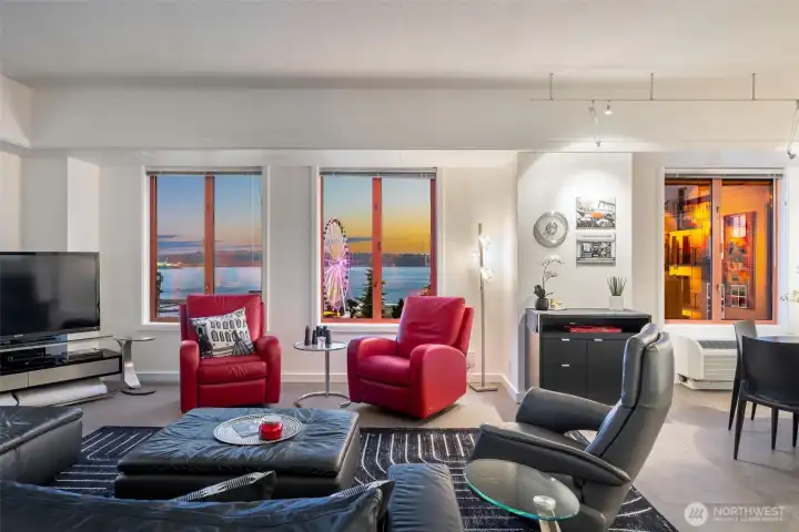 Wide living room layout creates multiple seating areas within the great room.