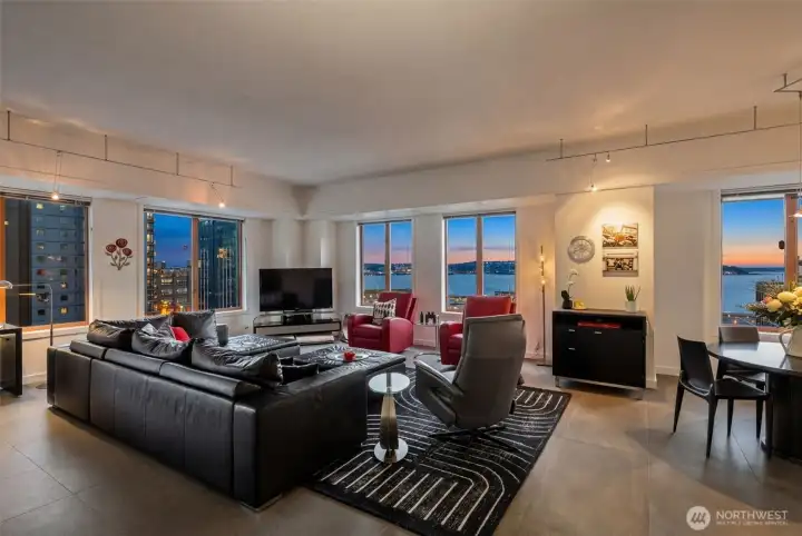 Warm evening ambiance highlights the home’s spacious living area.