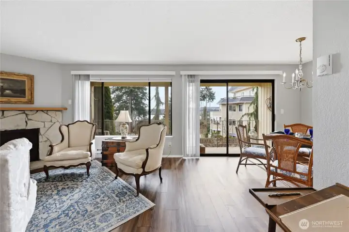 Nice open living room to dining with access to lovely covered balcony with storage.