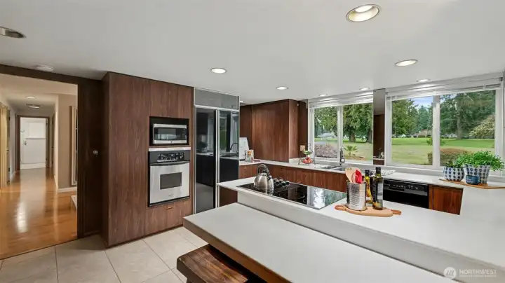 Enjoy a kitchen that combines efficiency and storage with ample cabinetry and built-in appliances.