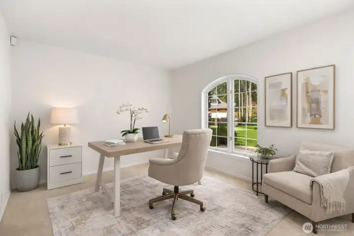 Spacious office filled with natural light.